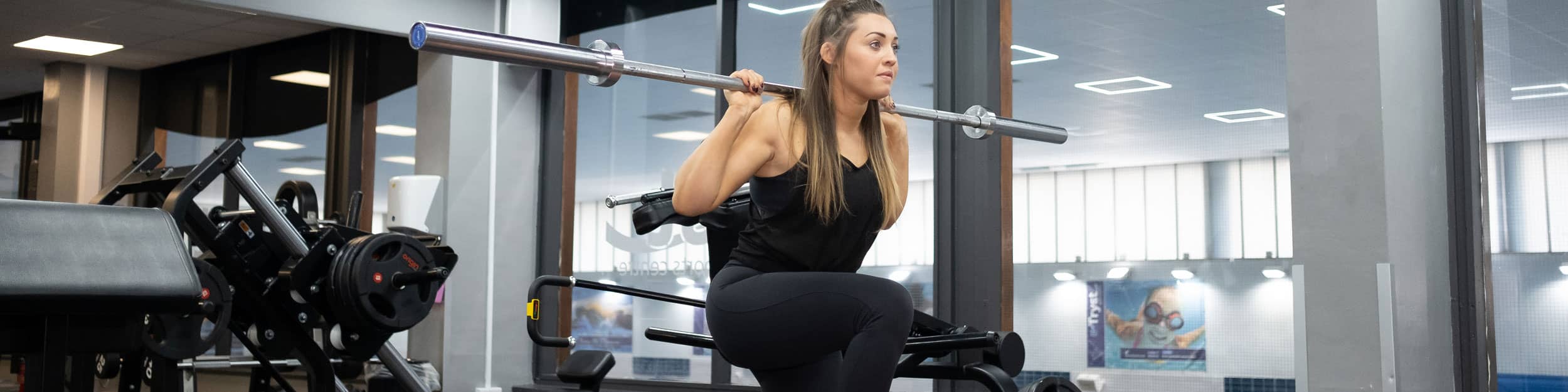 Join Active NL - image showing woman working out in a gym